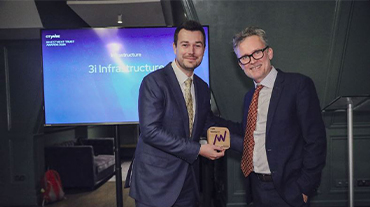 Two men holding Citywire award trophy for 3i Infrastructure